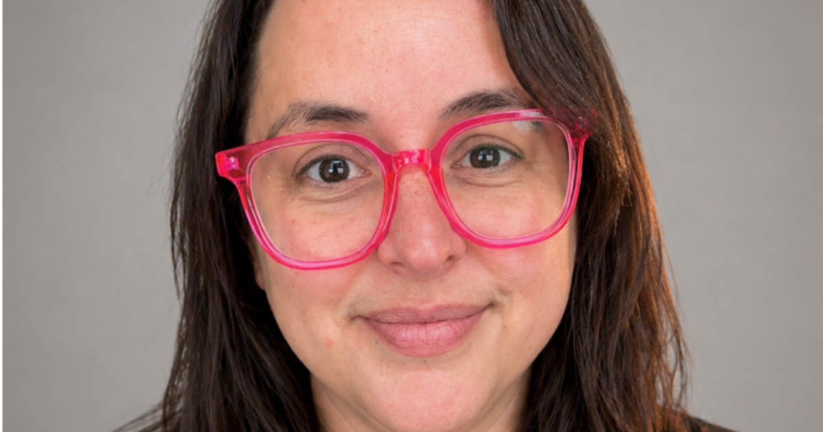 Portrait of Jeni Marie, founder and operations strategist.