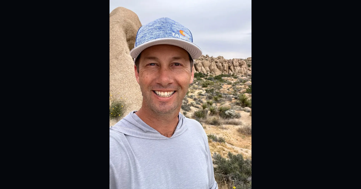 SEO expert Geoff Kenyon standing among desert rock formations in Joshua Tree.